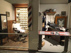 Museum exhibits represent a barber shop and a medical office